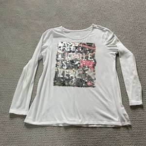 White long sleeve Justice shirt with large sequin design on front.